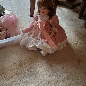 Two dolls they are very old but in good condition